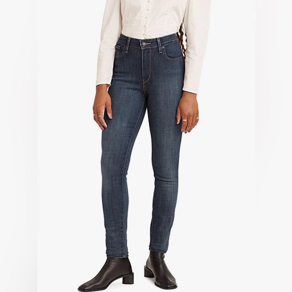 Levi’s Woman’s 721 High Rise Skinny size 27W, 30L. Dark blue, “Blue Story”.